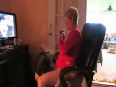 The wife of a mature dog slut appears like a beastiality porn star and plays with the dog.